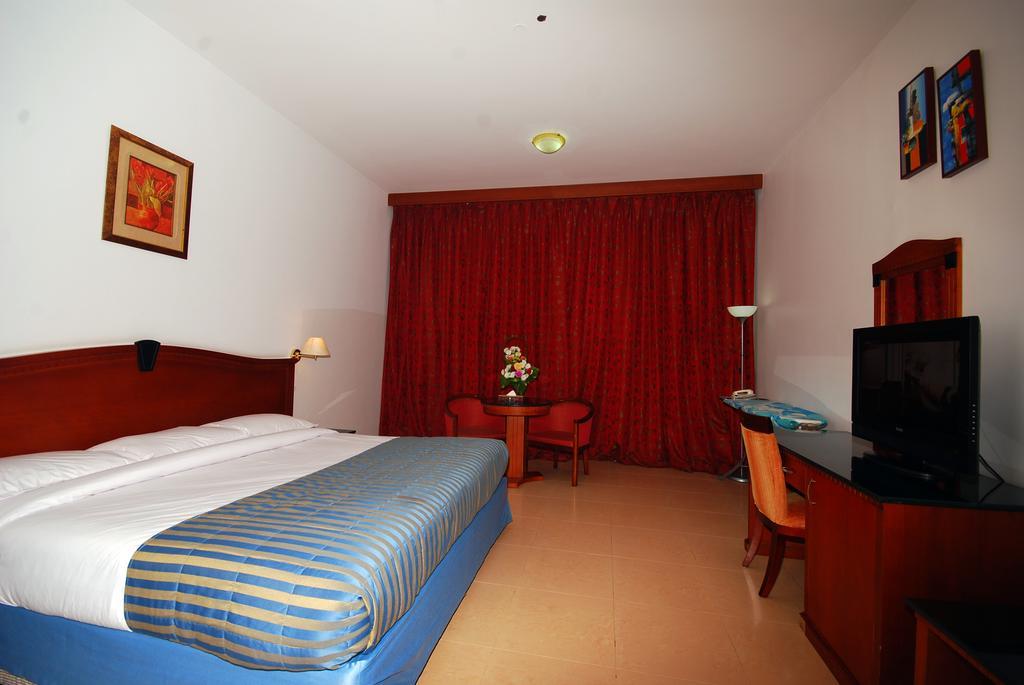 Ramee Garden Hotel Apartments Αμπού Ντάμπι Δωμάτιο φωτογραφία